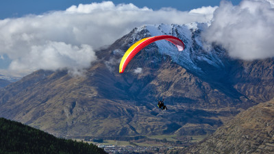 Paraglider up in the sky
