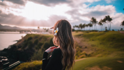 Beautiful girl in the hawaiian landscape