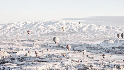 Hot air balloons in Winter landscape