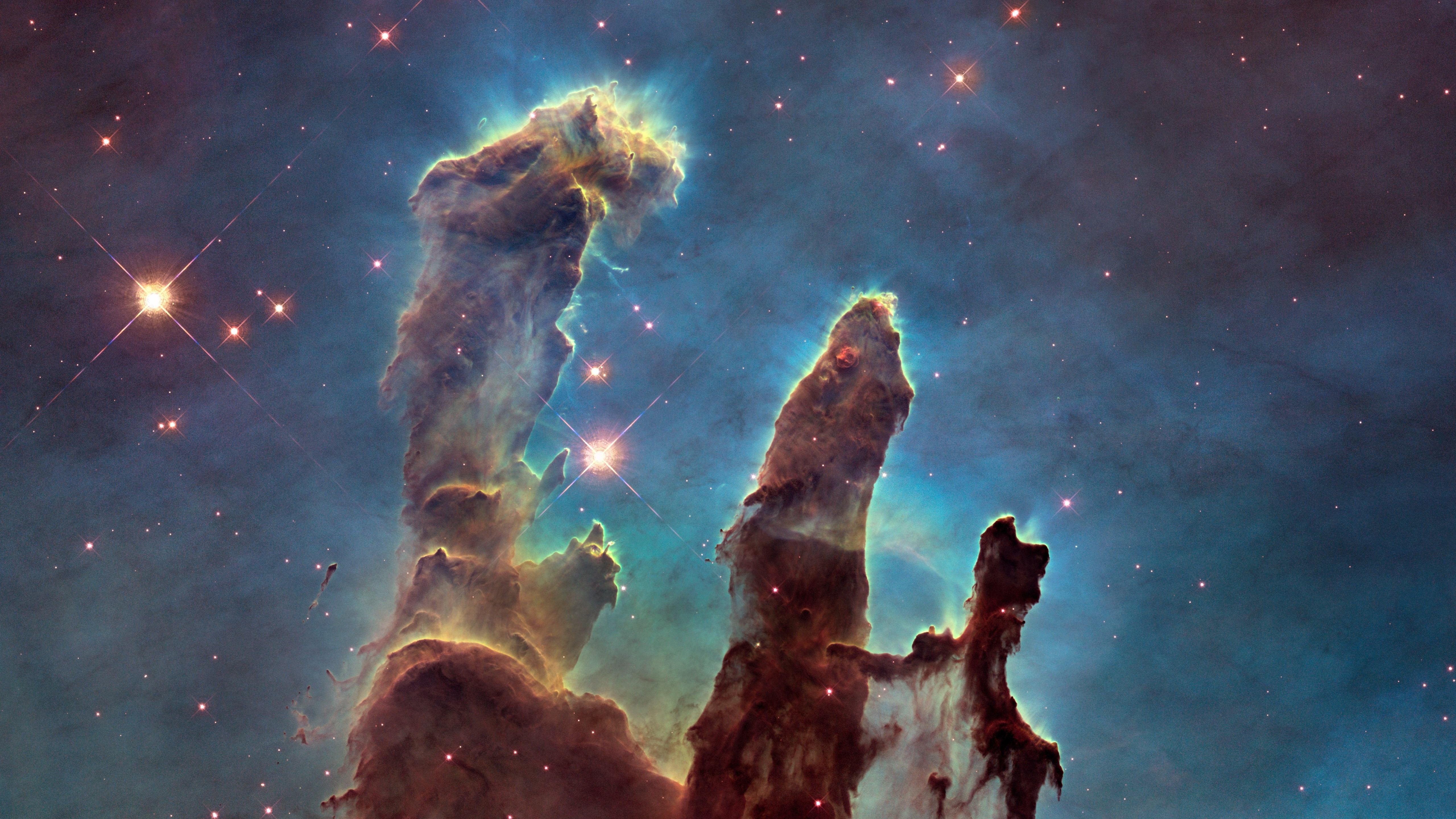The Eagle Nebula's Pillars of Creation wallpaper 5120x2880