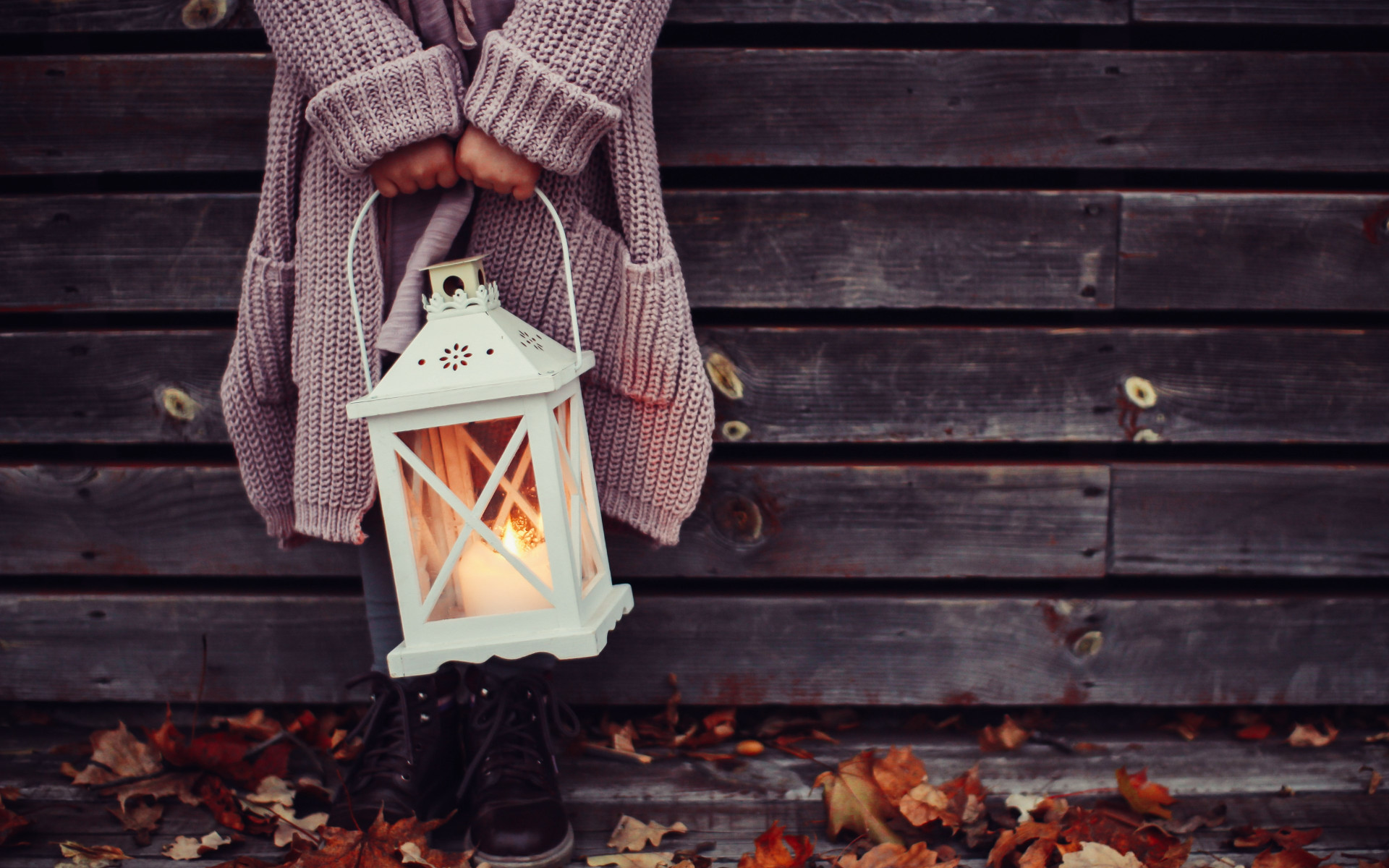 Autumn leaves and a child with lantern wallpaper 1920x1200