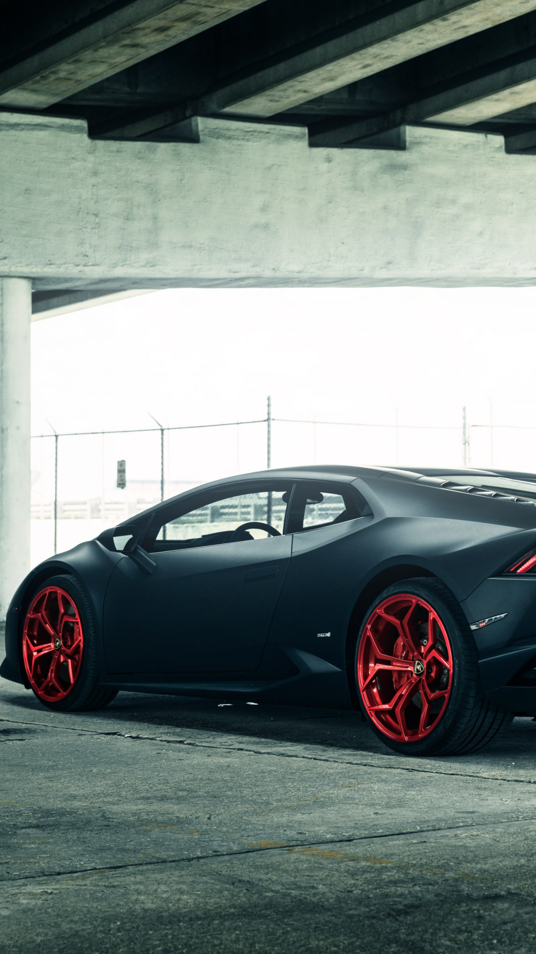 Vellano Matte Black Lamborghini Huracan on Red 3 wallpaper 1080x1920