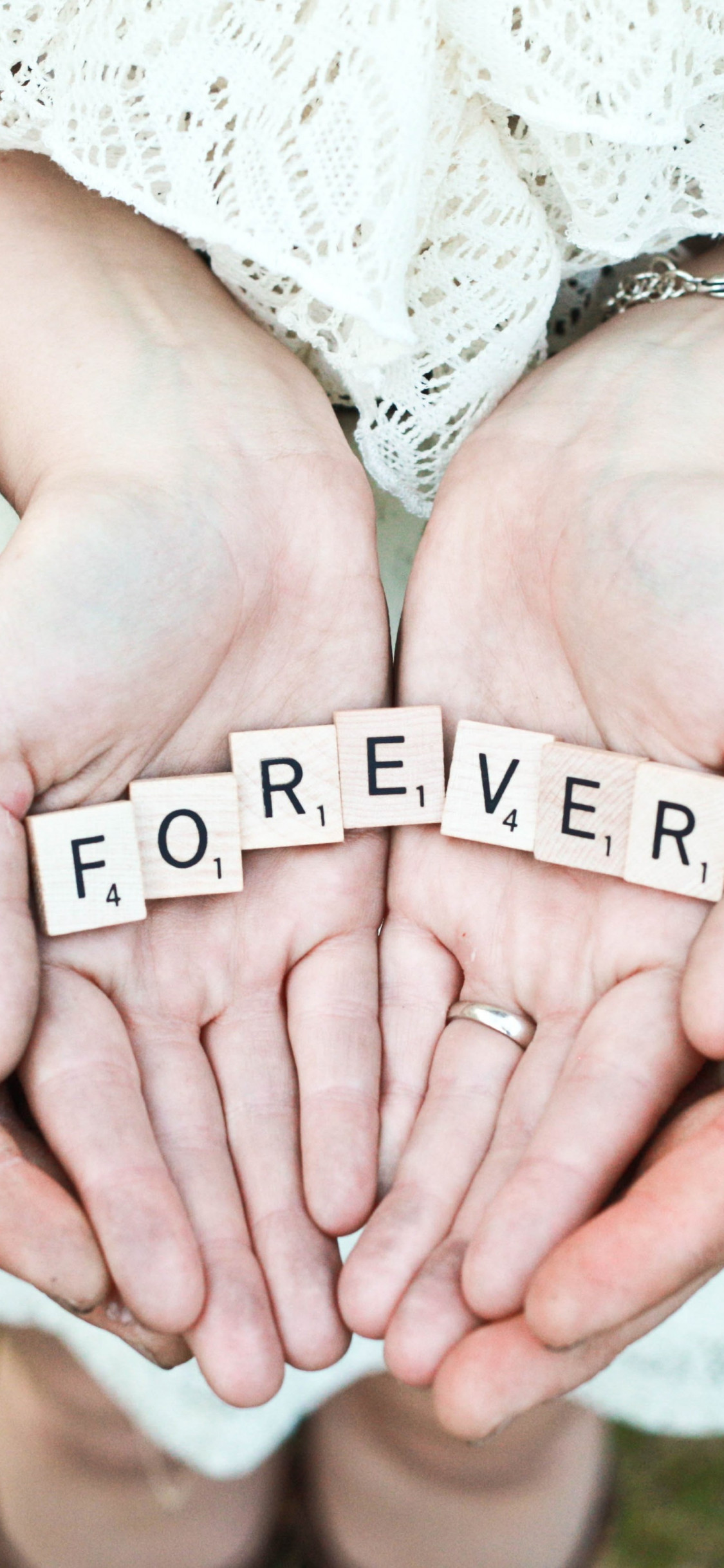 Forever message in their hands wallpaper 1125x2436