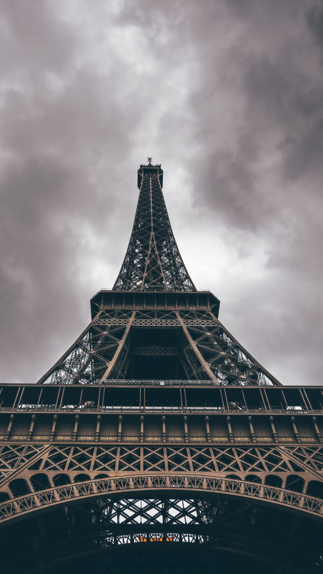 Eiffel Tower in a cloudy day wallpaper 1080x1920