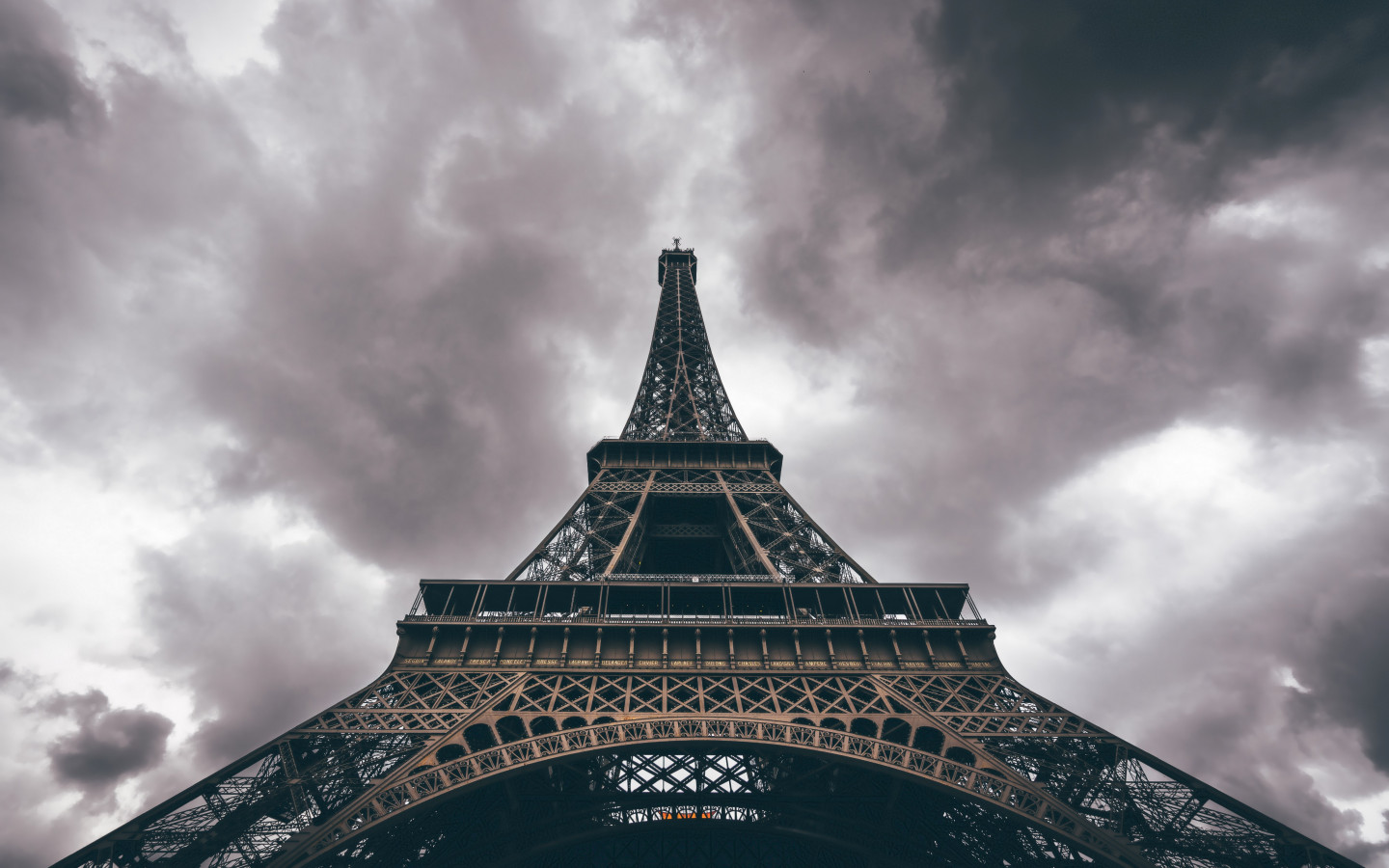 Eiffel Tower in a cloudy day wallpaper 1440x900