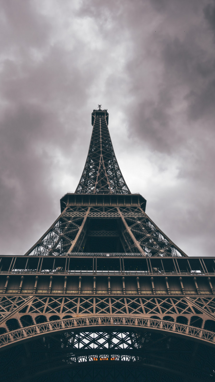 Eiffel Tower in a cloudy day wallpaper 750x1334