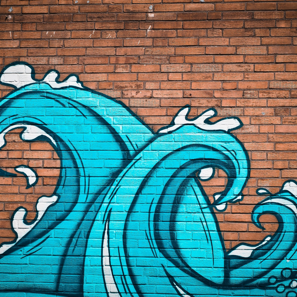 Graffiti waves on brick wall wallpaper 1024x1024