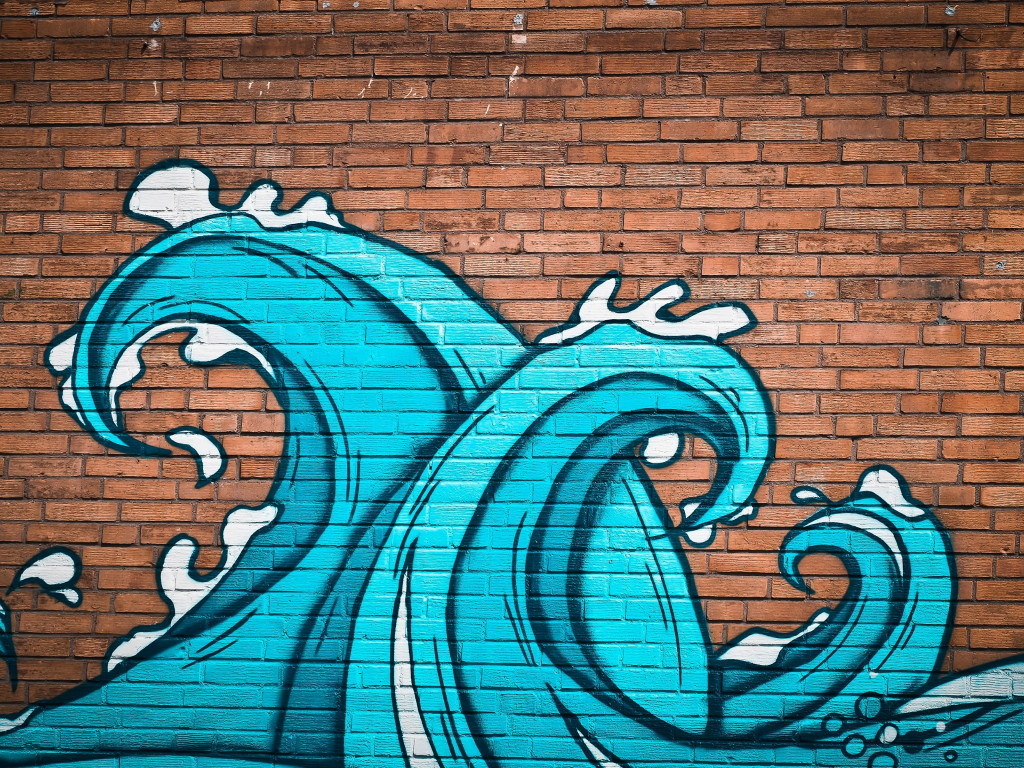 Graffiti waves on brick wall wallpaper 1024x768