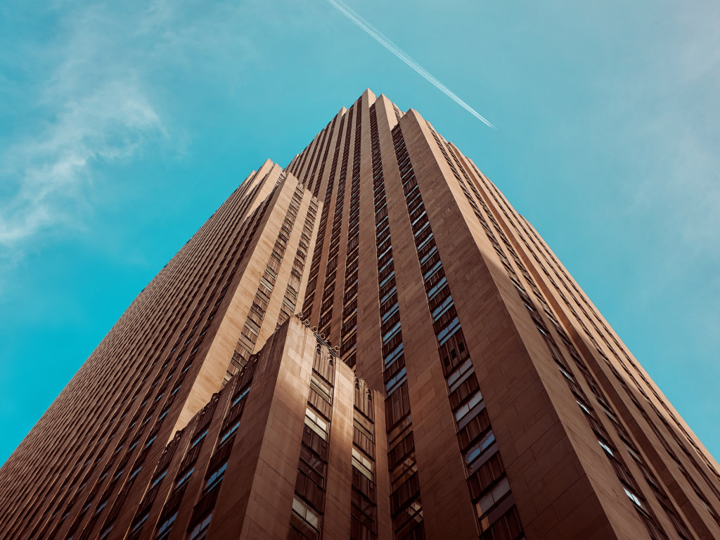 Rockefeller building touching the sky wallpaper 1024x768