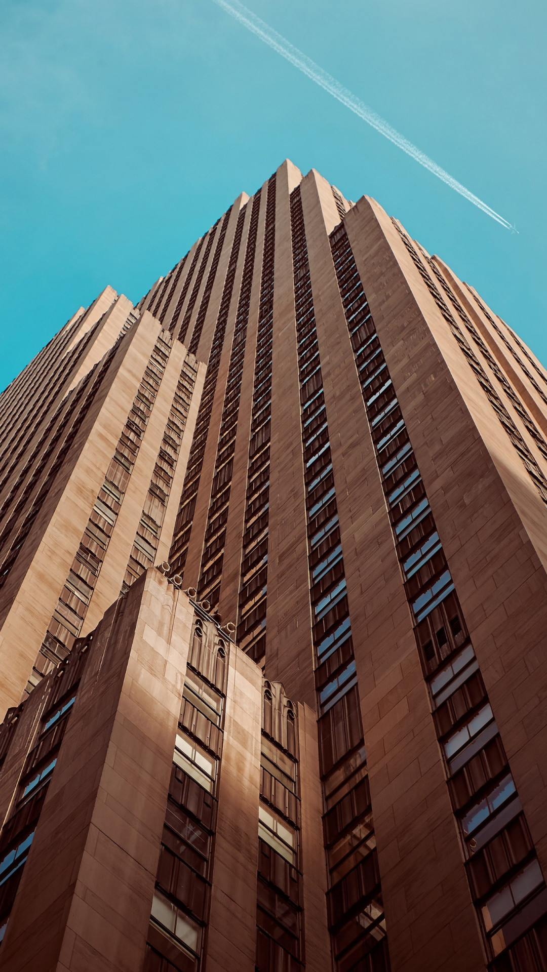 Rockefeller building touching the sky wallpaper 1080x1920