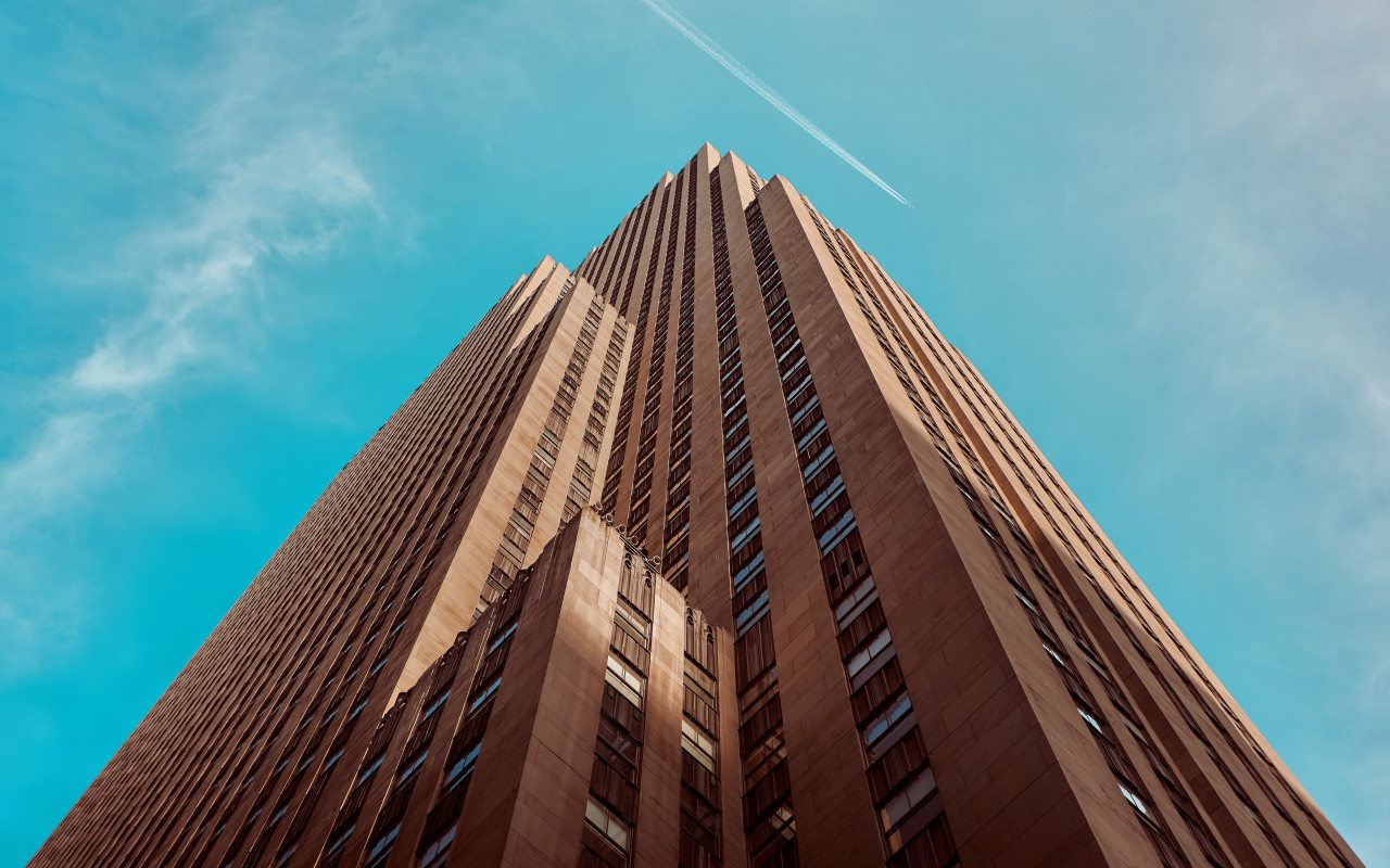 Rockefeller building touching the sky wallpaper 1280x800