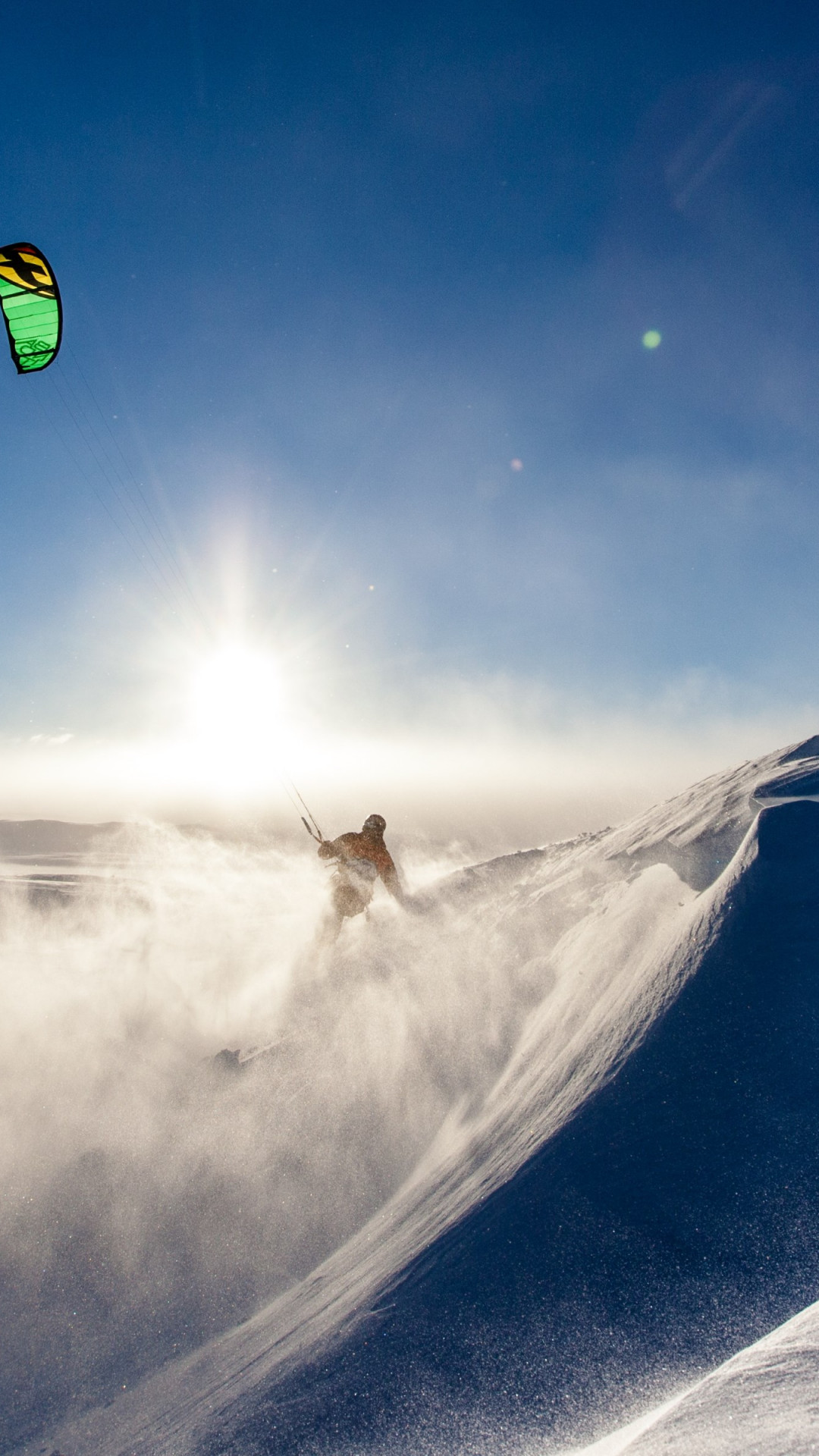 Kiteboarder on snow wallpaper 1080x1920