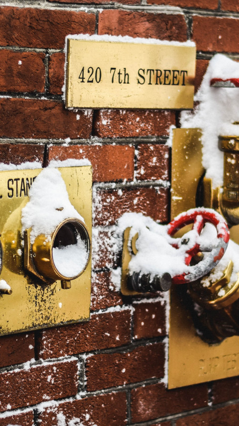 Snow covered fire standpipes in Washington wallpaper 480x854