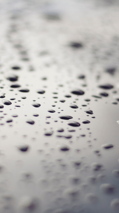 Raindrops on a metallic surface wallpaper 480x854