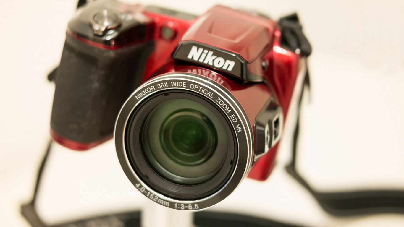 Nikon Camera with Nikkor lens wallpaper 1366x768