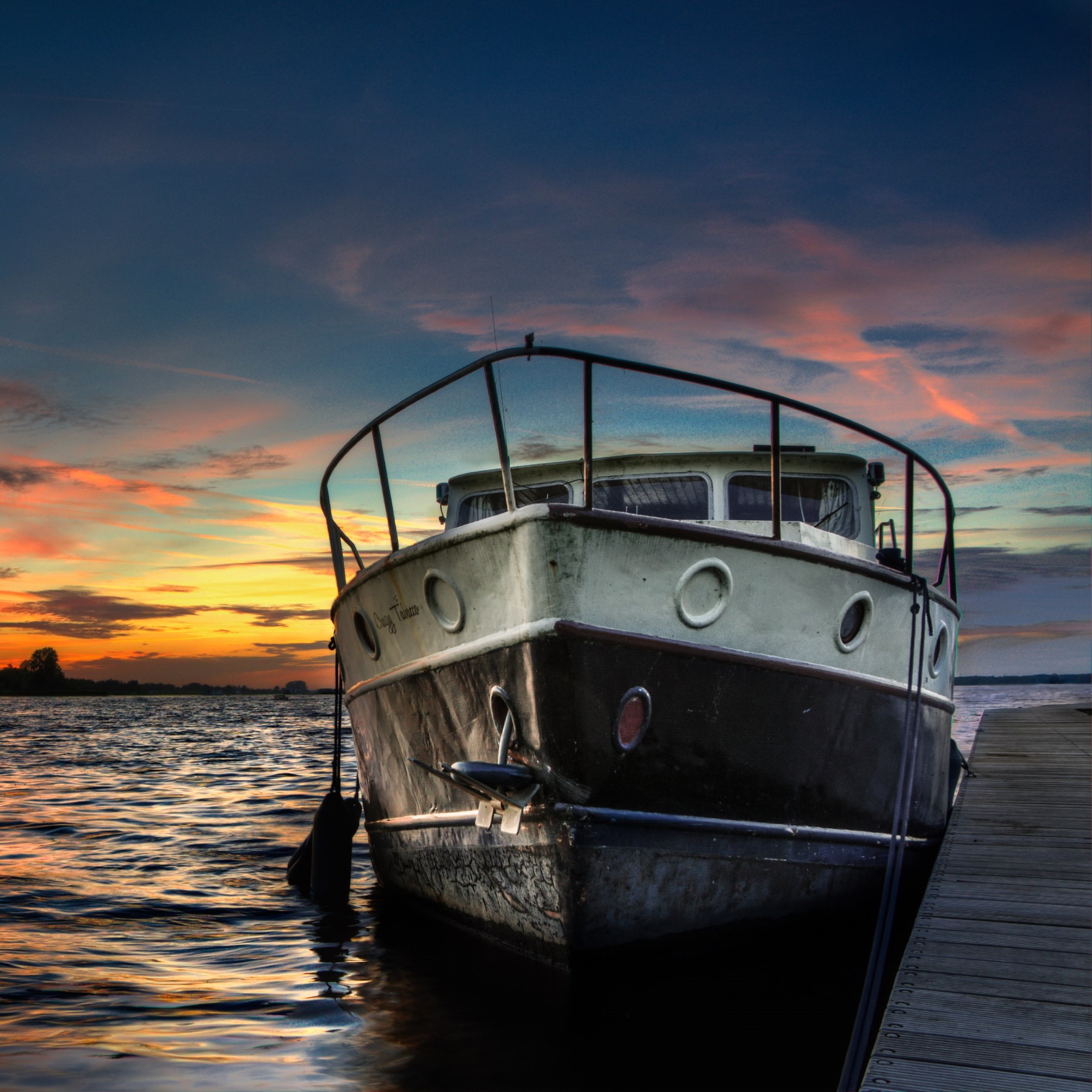 Boat and sunset in background wallpaper 2224x2224