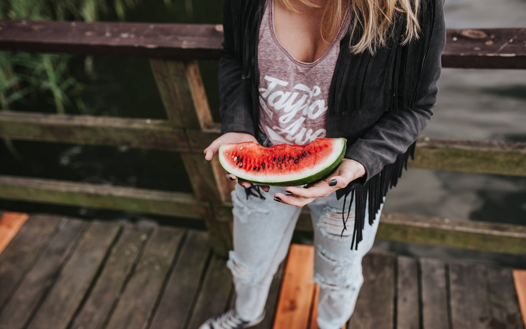 The girl with a watermelon slice wallpaper 1680x1050