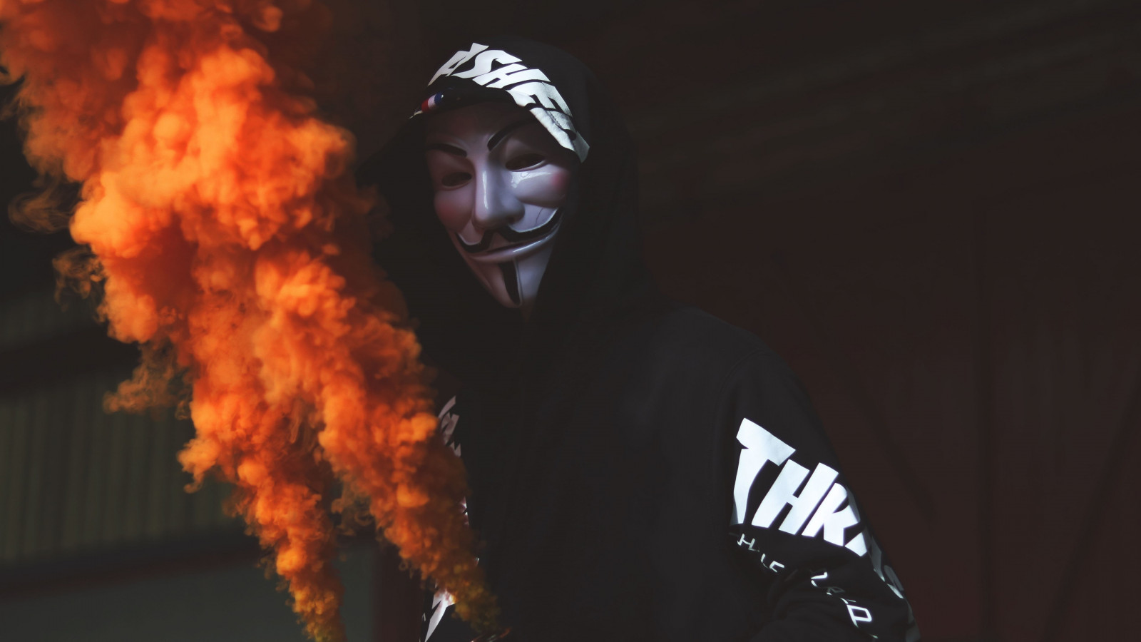 Anonymous mask and orange smoke wallpaper 1600x900