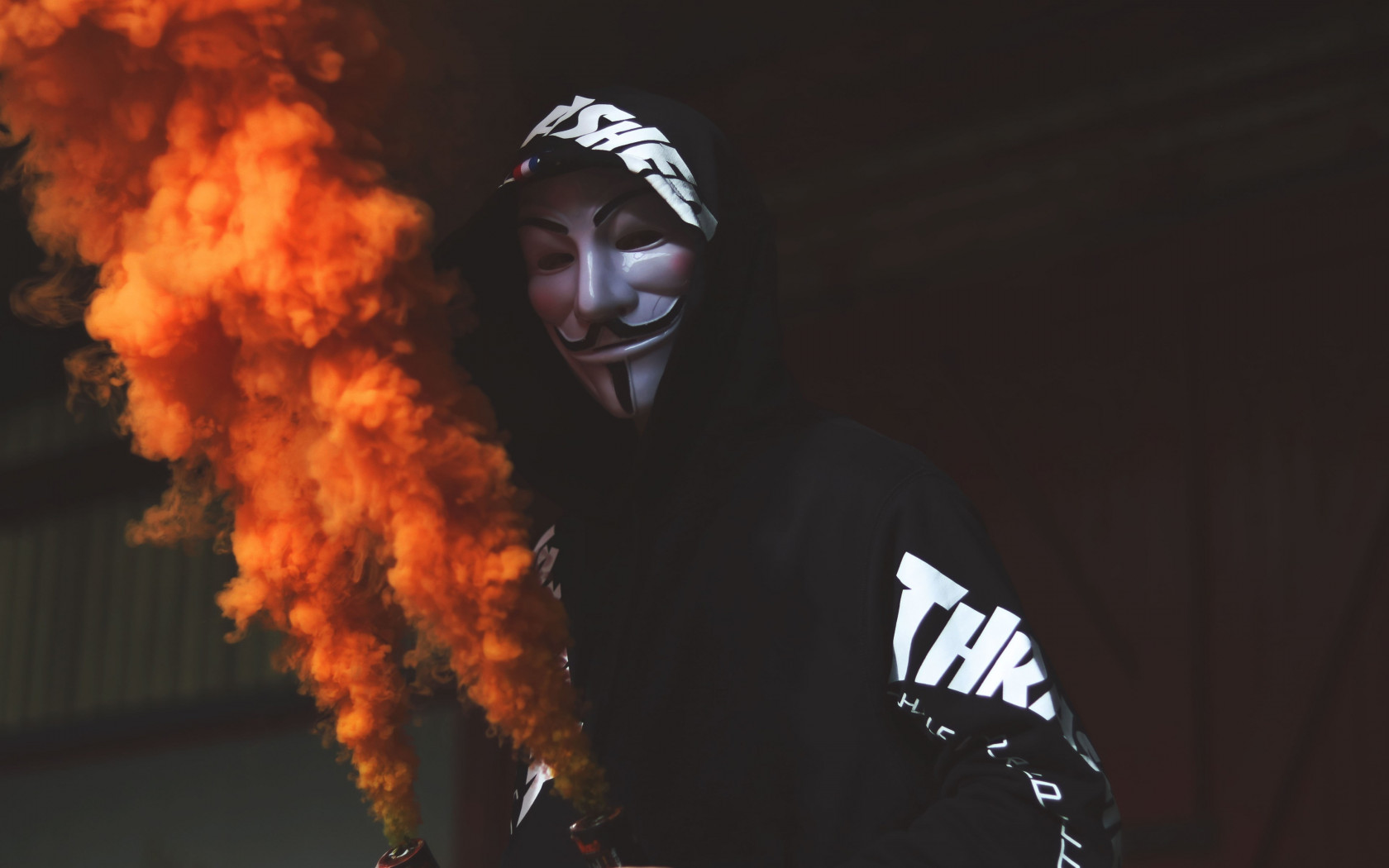 Anonymous mask and orange smoke wallpaper 1680x1050