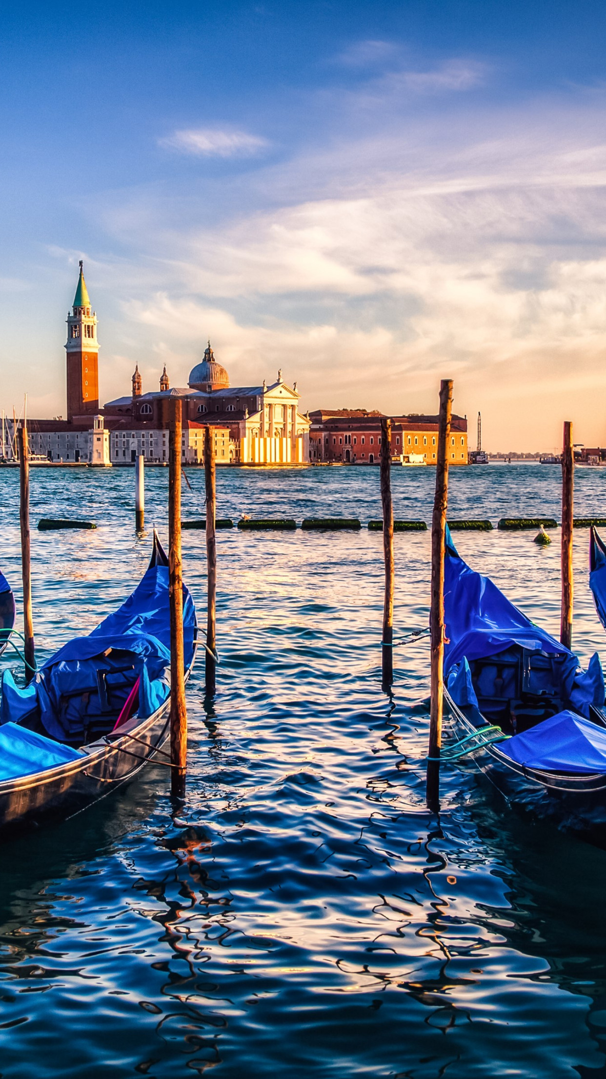 Gondolas from Venice at sunset wallpaper 1242x2208