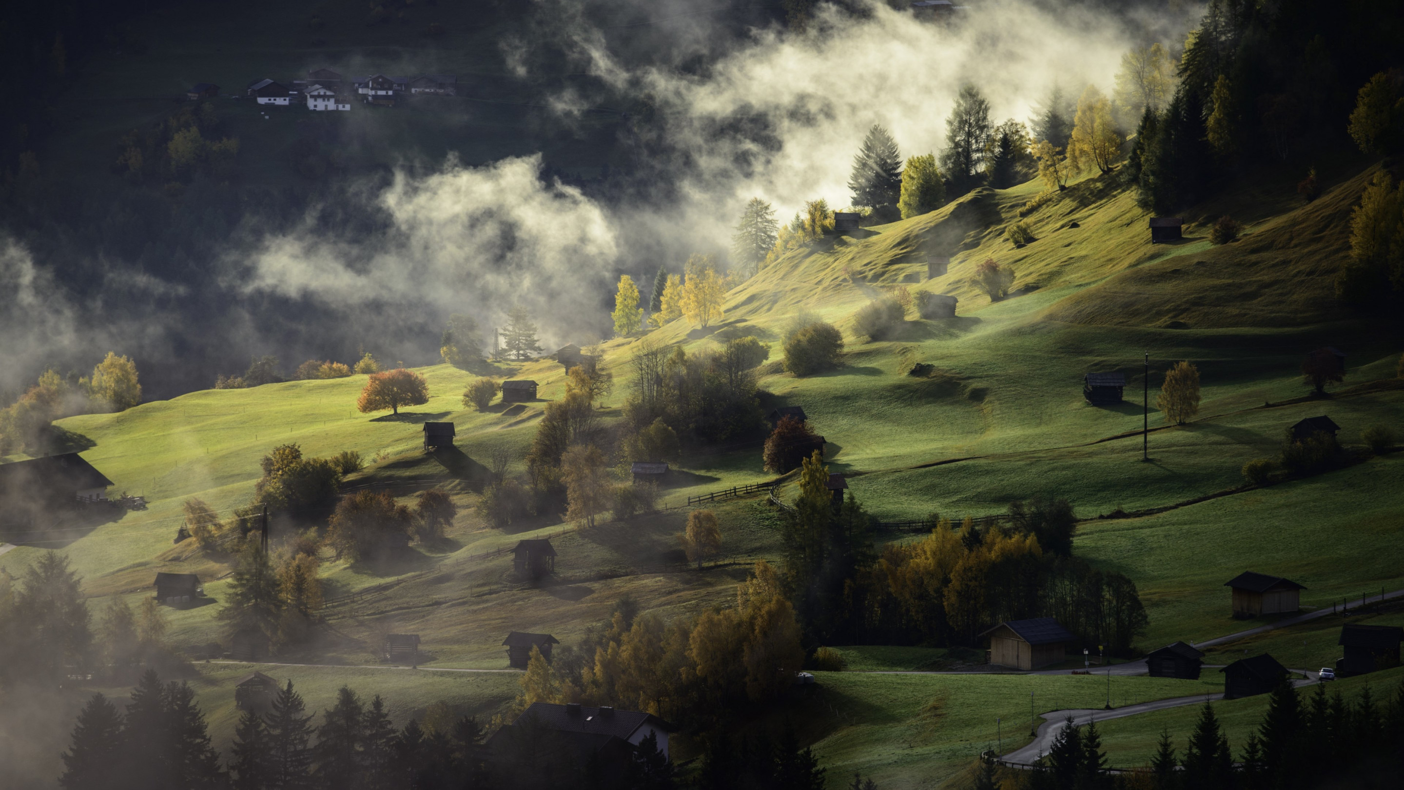 Fog, landscape and a village wallpaper 2880x1620