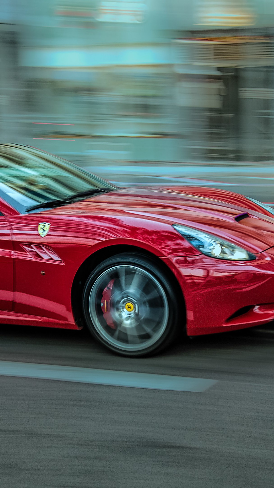 Ferrari in motion wallpaper 1080x1920