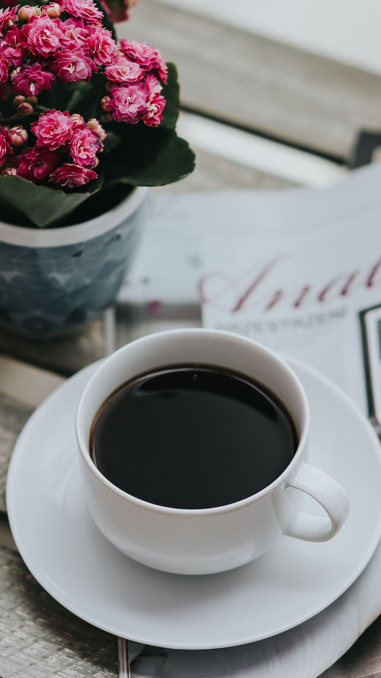 One coffee cup and one magazine wallpaper 750x1334