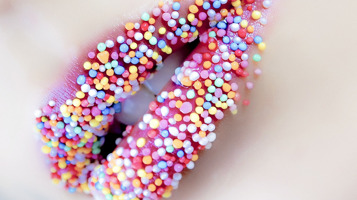 Lips with sweets wallpaper 1366x768