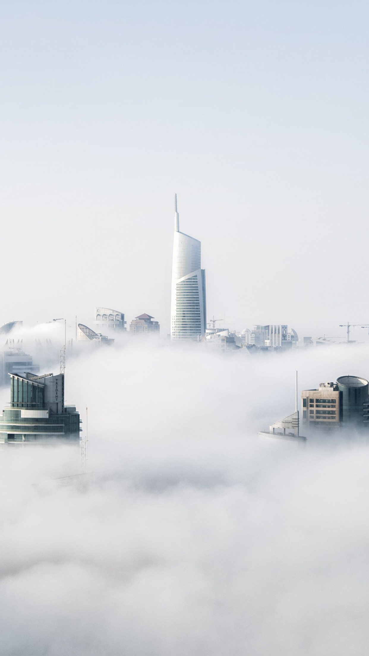 Fog is over Dubai wallpaper 1242x2208