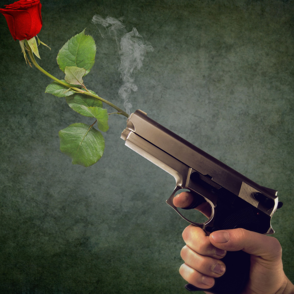 Peaceful act. Pistol and red rose wallpaper 1024x1024