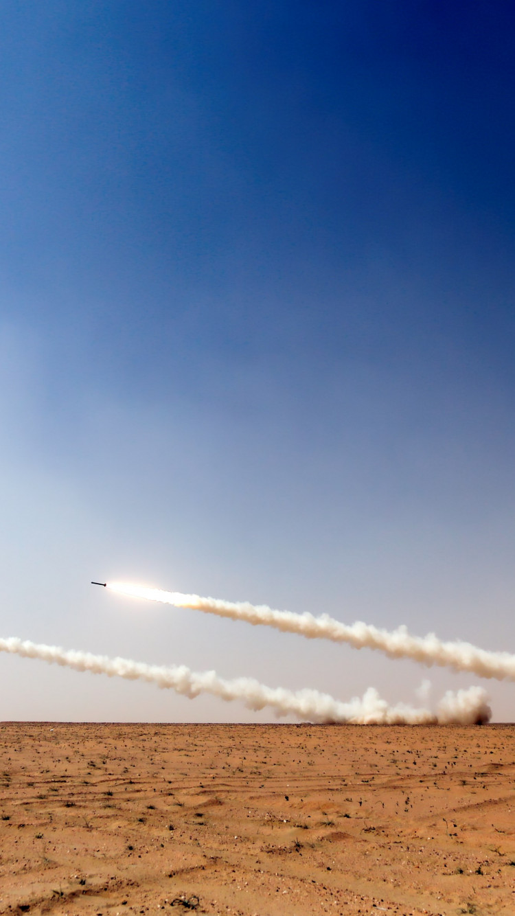 Military rockets on the sky wallpaper 750x1334