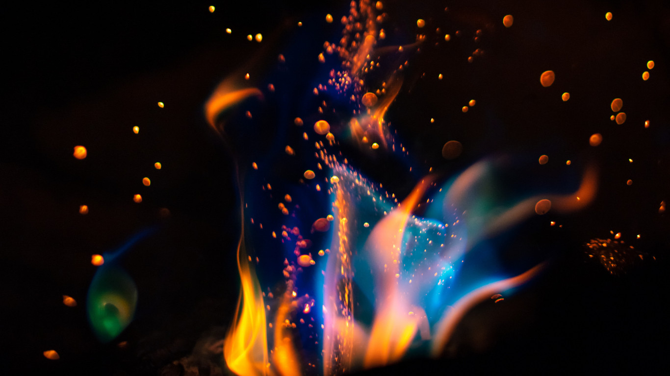 Hot flames in darkness wallpaper 1366x768