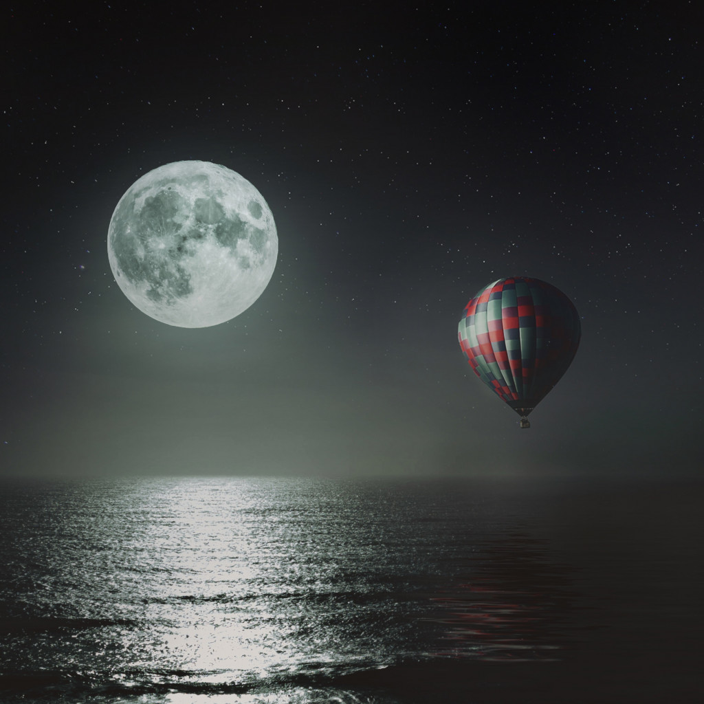 Hot air balloon over the night sky wallpaper 1024x1024