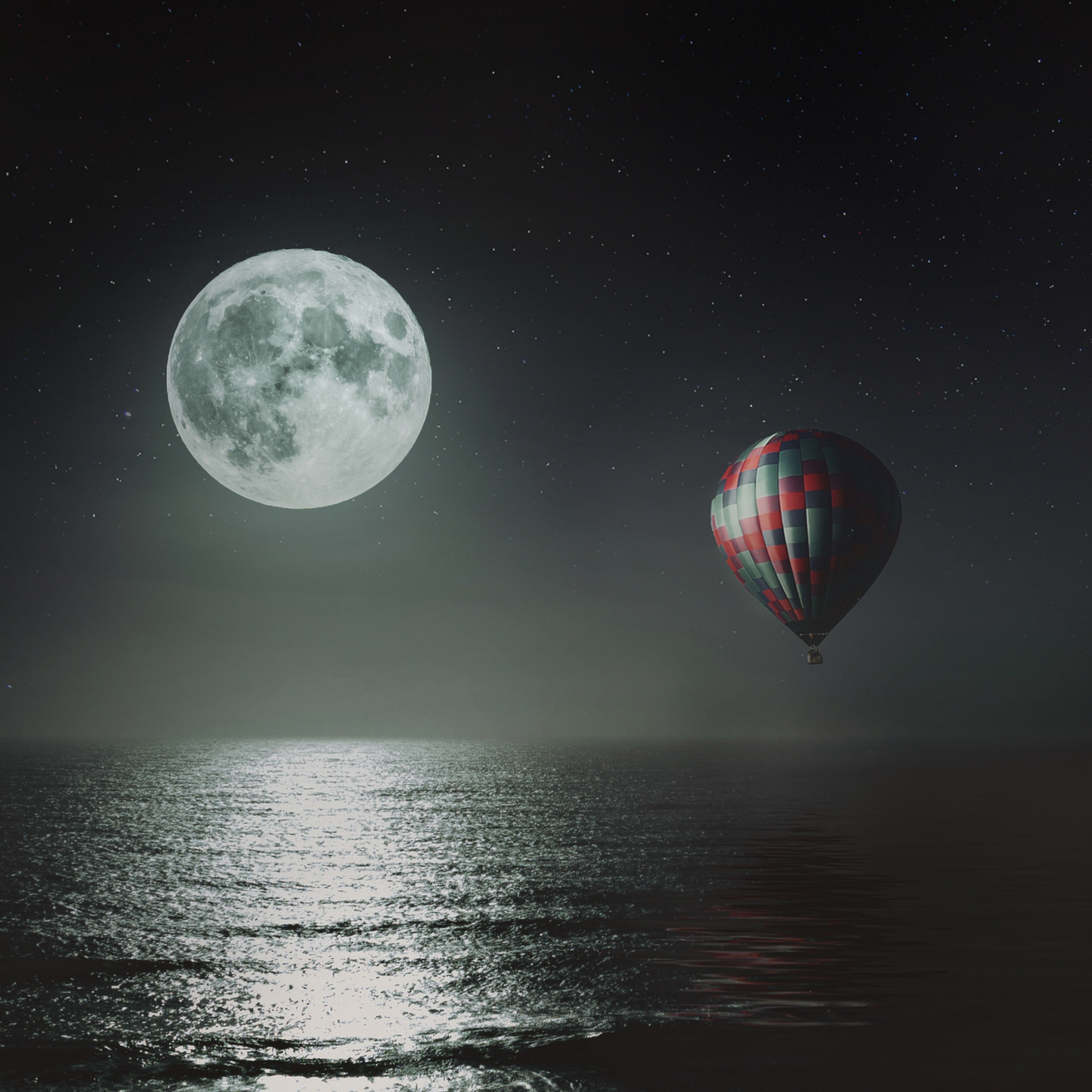 Hot air balloon over the night sky wallpaper 2048x2048