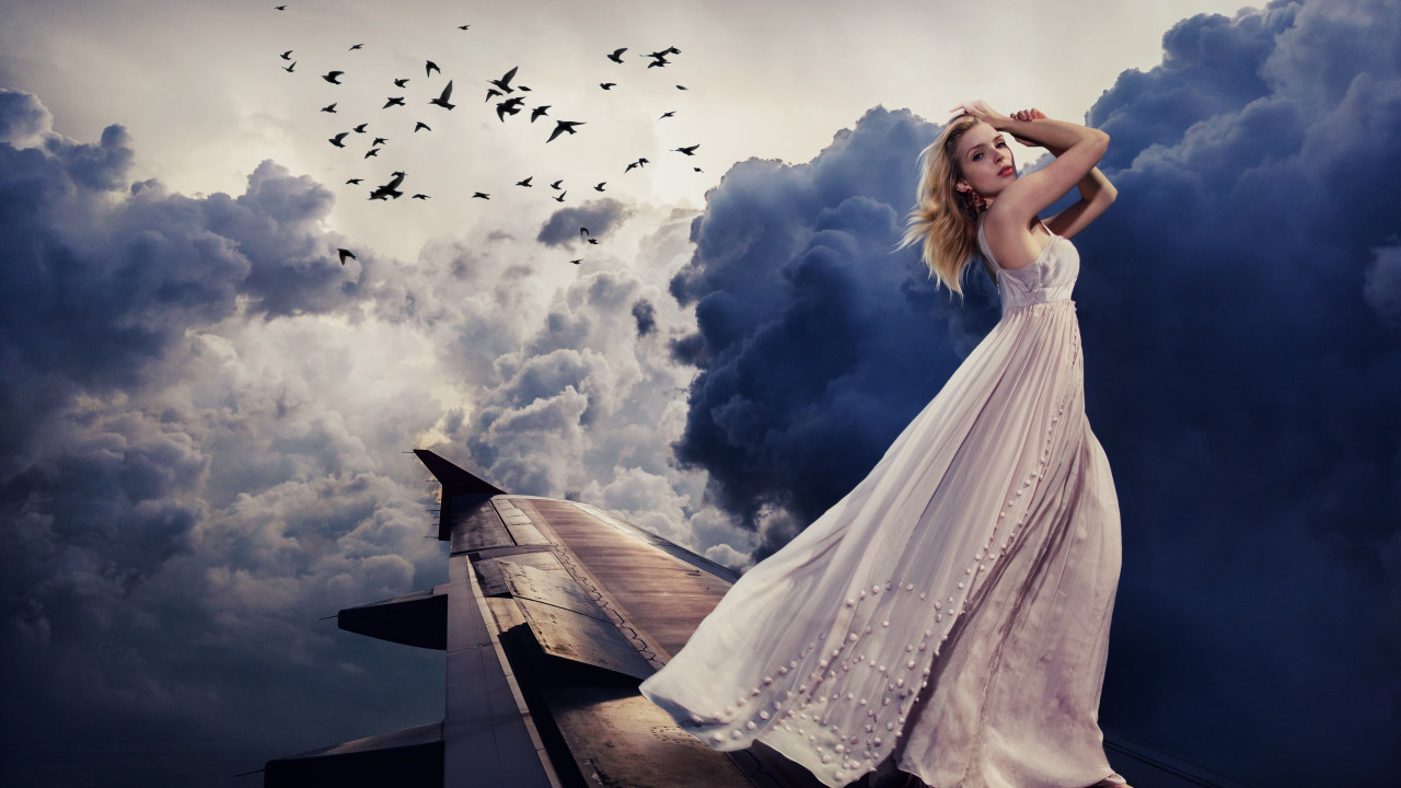 Beautiful girl on the airplane wing wallpaper 1280x720