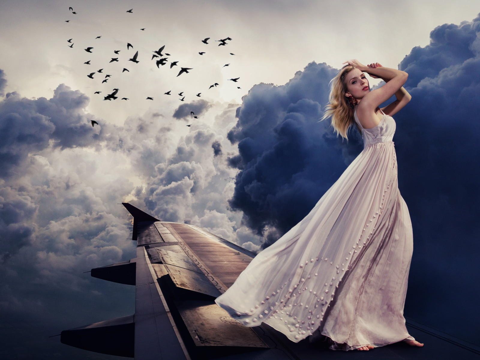 Beautiful girl on the airplane wing wallpaper 1600x1200