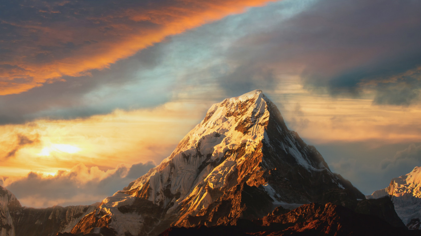 Mountain peak covered with snow wallpaper 1366x768