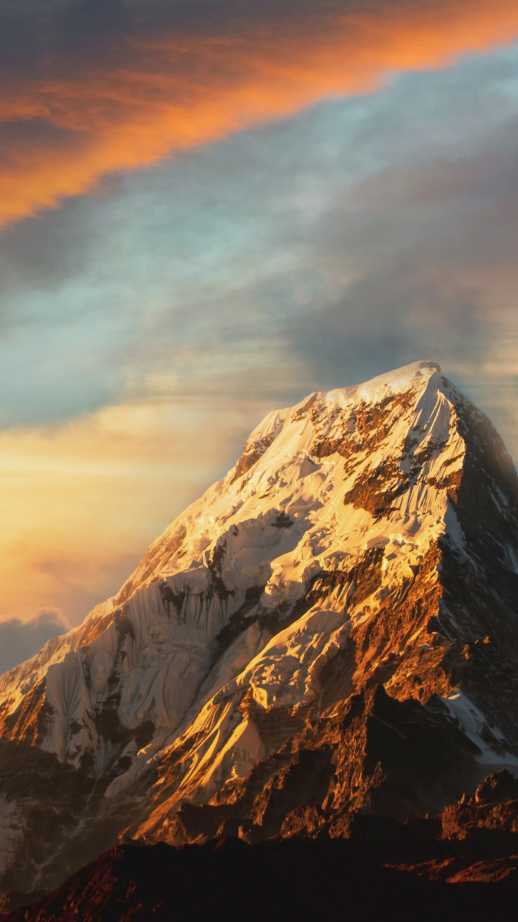 Mountain peak covered with snow wallpaper 750x1334