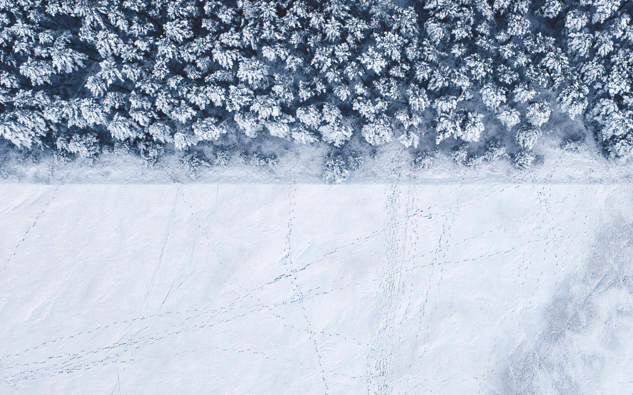 Winter landscape seen from a drone wallpaper 1280x800
