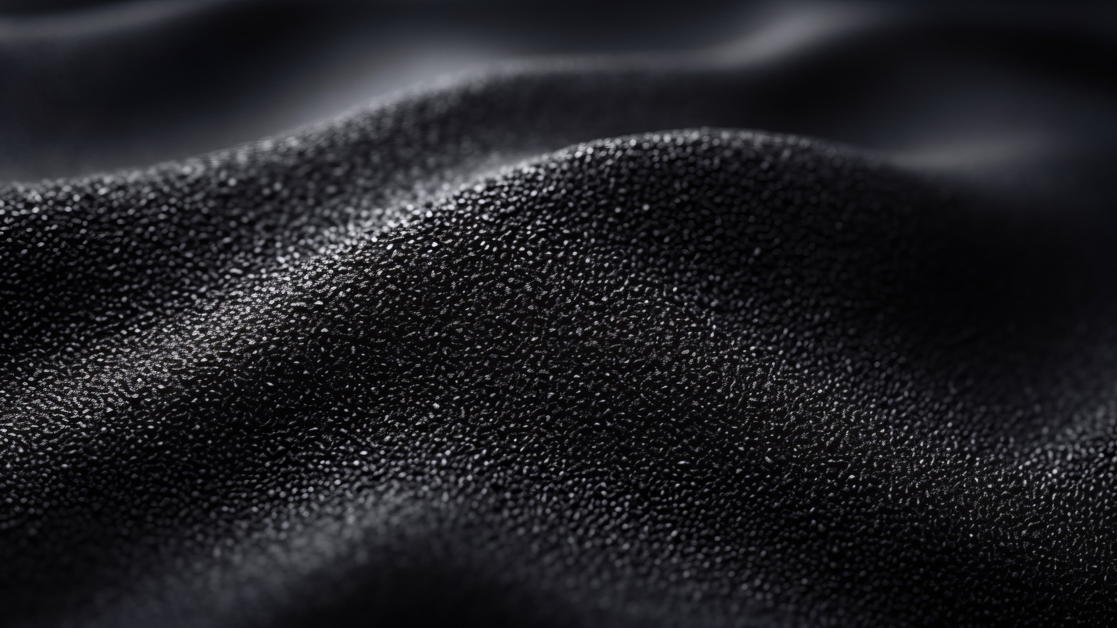 Black sand from iPhone 15 wallpaper 1600x900